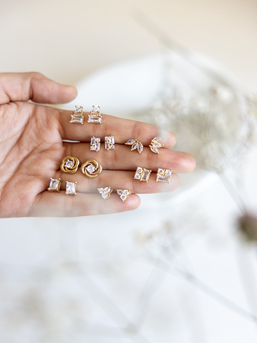 Seven Shades of Sparkle Diamond Brass Studs (Anti Tarnish) - Pair of 7 Earrings